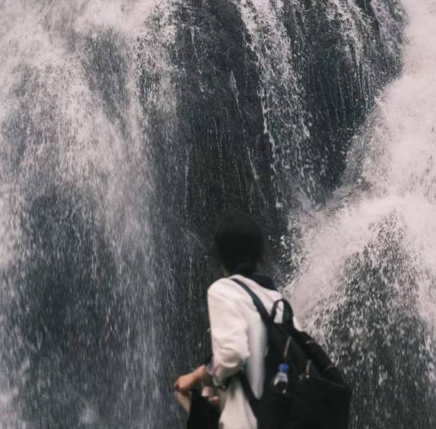 standing in the spray