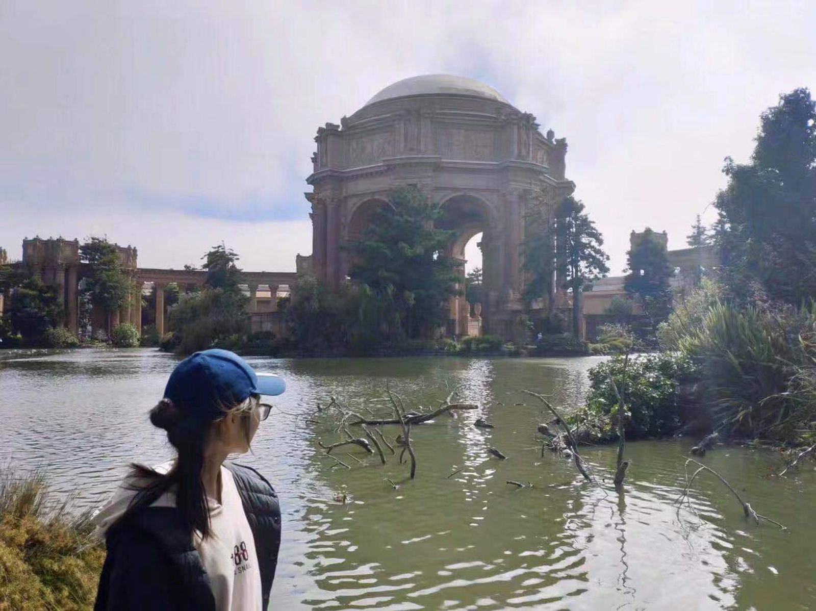 The Palace of Fine Arts rotunda reflected in its lagoon, San Francisco