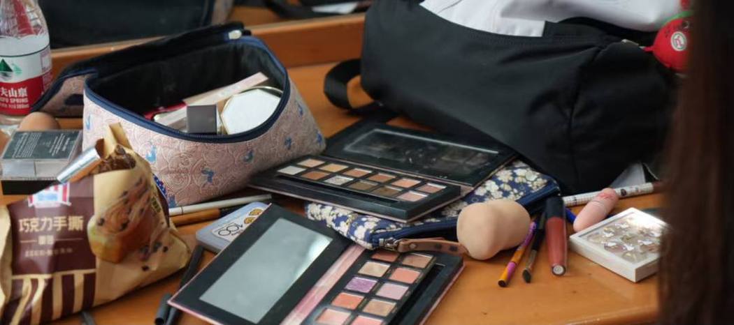 the makeup table, an hour before
