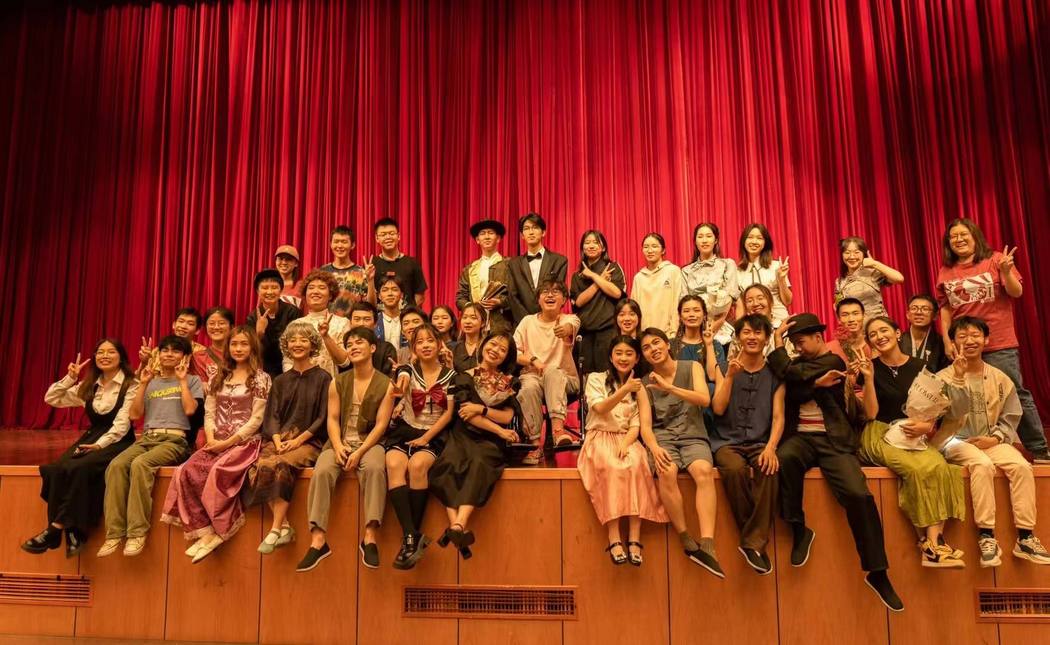 the company, red curtain